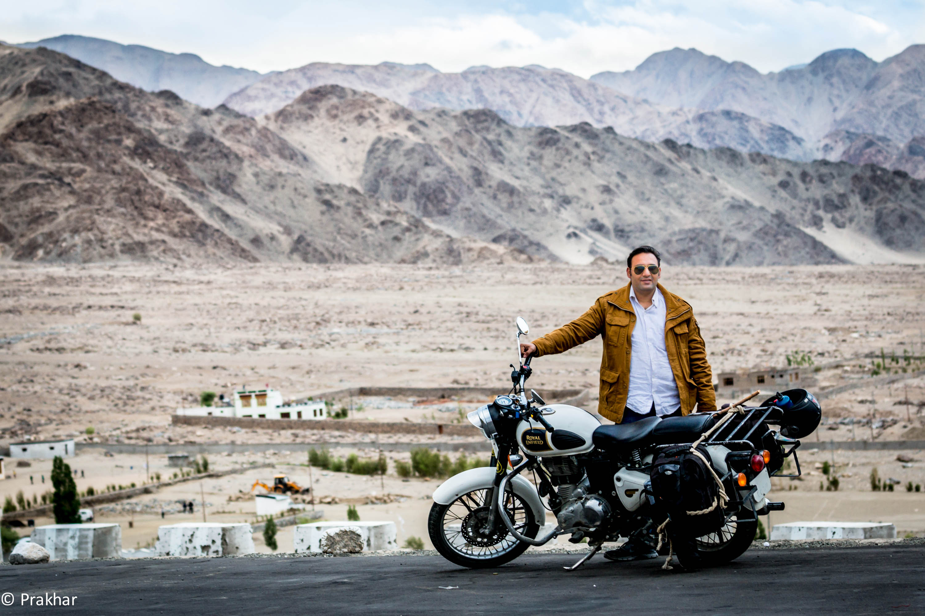 Prakhar with Royal Enfield in Ladakh — desert mountains